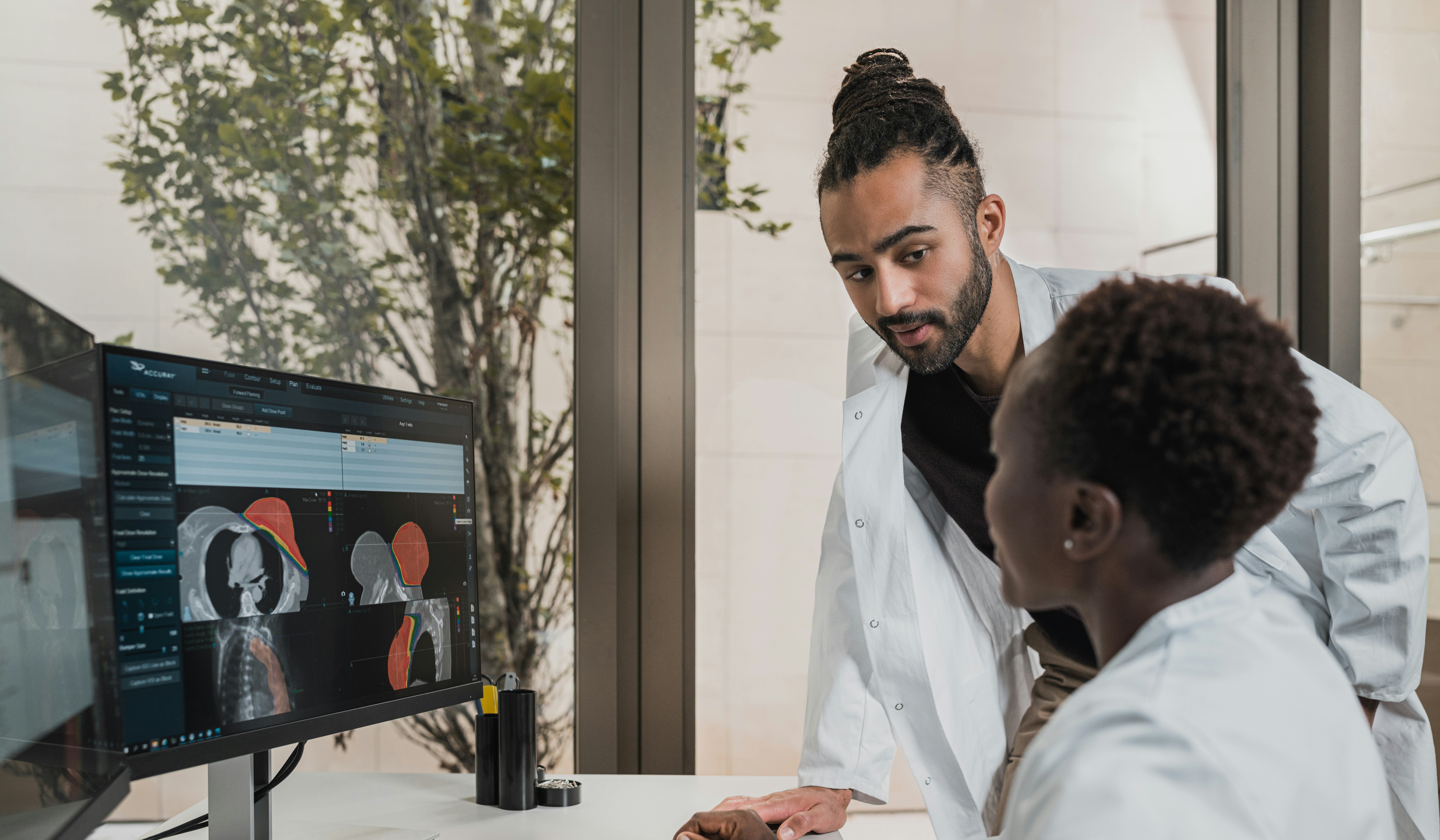 Physician reviewing imaging with a patient